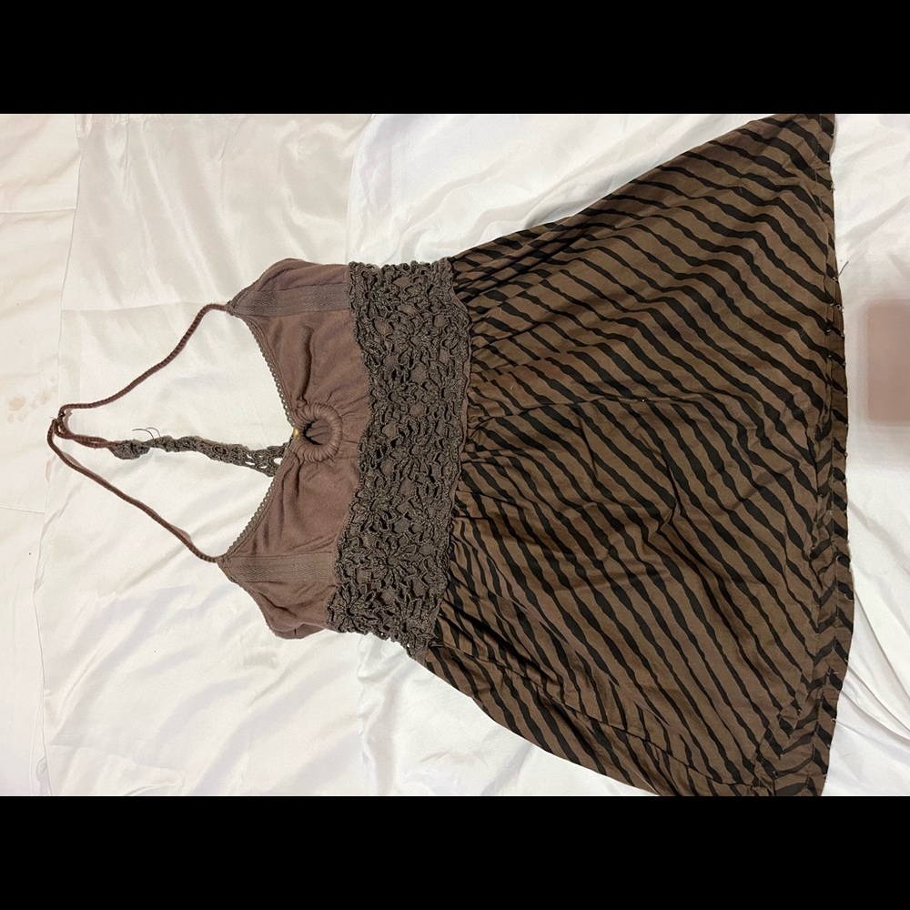 Free People top with braid on back circle in front